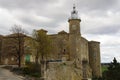 Stone village and its typical church of the south of France with its wrought iron roof Royalty Free Stock Photo