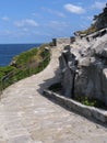 Stone walkway along coast Royalty Free Stock Photo