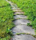 Stone walkway in the garden Royalty Free Stock Photo