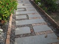 Stone walkway in the garden, Thailand. Selective focus