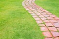 Stone walkway in the park grass