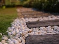 Stone walkways in the backyard, low and night light.