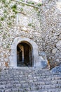 The stone wall and arched passageway of the Fortress of Palamidi in Nafplio, Greece Royalty Free Stock Photo