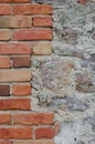 Stone wall background closeup, vertical plastered grunge red brick stonewall, beige limestone pattern, old aged weathered beige Royalty Free Stock Photo