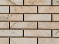 Stone wall background. Decorative bricks or marble tiles Royalty Free Stock Photo