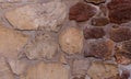 Stone Wall Background.Old Castle Stone Wall Texture Surface,Part of Real Natural Brick and Granite Wall in Light Brown,Dark Brown Royalty Free Stock Photo