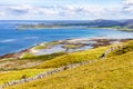 Stone wall with Ballyvaughan bay in background Royalty Free Stock Photo