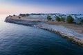 Stone wall on the Baltic sea in the summer. Osmussaar coast, island in Estonia Royalty Free Stock Photo