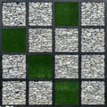 Stone wall block with green artificial grass Royalty Free Stock Photo
