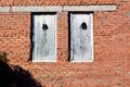 Stone wall and blue window shutter. Traditional house Royalty Free Stock Photo