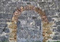 Stone Wall With Brick Arch Royalty Free Stock Photo