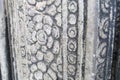 Stone wall carving Cambodia bas-relief flowers Angkor Wat Royalty Free Stock Photo