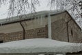 Stone wall of church in winter Royalty Free Stock Photo