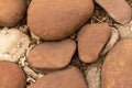 Stone wall close up cobblestone brown background foundation solid natural