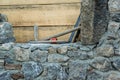Stone wall construction and masonry tools Royalty Free Stock Photo