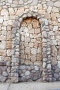 Stone wall with corbel arch Royalty Free Stock Photo