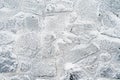 Stone wall covered with snow and ice Royalty Free Stock Photo