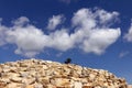 Stone wall decoration on blue sky and white cloud Royalty Free Stock Photo