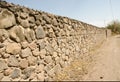 Stone Wall and dirt road Royalty Free Stock Photo