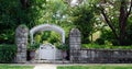 Stone Wall with Garden Gate Royalty Free Stock Photo