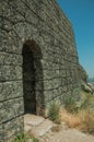 Stone wall with gateway on hilltop at the Castle of Monsanto Royalty Free Stock Photo