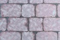 Stone wall from gray blocks close-up weathered, town square Royalty Free Stock Photo