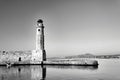 Stone wall and historic lighthouse in the port of Rethymnon