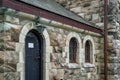 Stone wall of medieval stone church, Alesund, Norway. Royalty Free Stock Photo