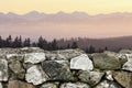 Stone wall and the mpuntains Royalty Free Stock Photo
