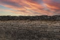 Stone wall and pink sky background Royalty Free Stock Photo