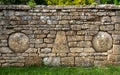 Stone wall in the pretty Cotswold village of Snowshill near Broadway in the English Cotswolds, Gloucestershire UK.