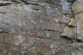 Stone wall of rock with cracks Royalty Free Stock Photo