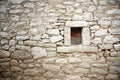 Stone wall with small window texture background