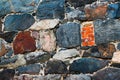 Stone wall texture background. Old rough outdoor rocks surface. Close-up natural pattern. Royalty Free Stock Photo