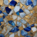 stone wall texture _A mosaic of blue and gold. The mosaic is made of small pieces of agate and granite, Royalty Free Stock Photo
