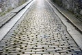 Stone walled cobbled street