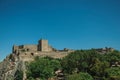 Stone walls and tower of Castle over hill near garden at Marvao Royalty Free Stock Photo