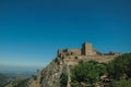 Stone walls and tower of Castle over hill near garden at Marvao Royalty Free Stock Photo