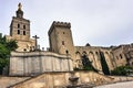 Stone walls and towers of the medieval Castle of the Popes in the city of Avignon Royalty Free Stock Photo