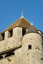 Stone walls and towers of a medieval castle in the town of Provins Royalty Free Stock Photo