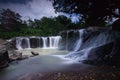 Stone waterfall and trees