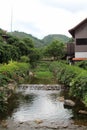 Stone weir on a stream Royalty Free Stock Photo