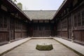 Stone well in courtyard of ancient Chinese dwelling building Royalty Free Stock Photo