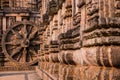 A stone wheel engraved in the walls of ancient Hindu Sun Temple, Konark, India. UNESCO World Heritage Royalty Free Stock Photo