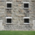 Stone window with metal lattice Royalty Free Stock Photo