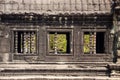 Stone windows with pillars. Angkor, Cambodia Royalty Free Stock Photo