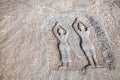 Stone with yoga people in Hampi