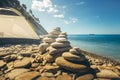 Stone Zen Pyramids At Beach With Tourist Tent On A Background. Concept Of Harmony And Balance