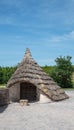 Stoneage  wooden hut with roof Royalty Free Stock Photo