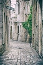 Stoned street in historic Trogir, analog filter